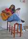 Brasilianische Gitarrenspielerin